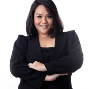 The asian woman on the white background.